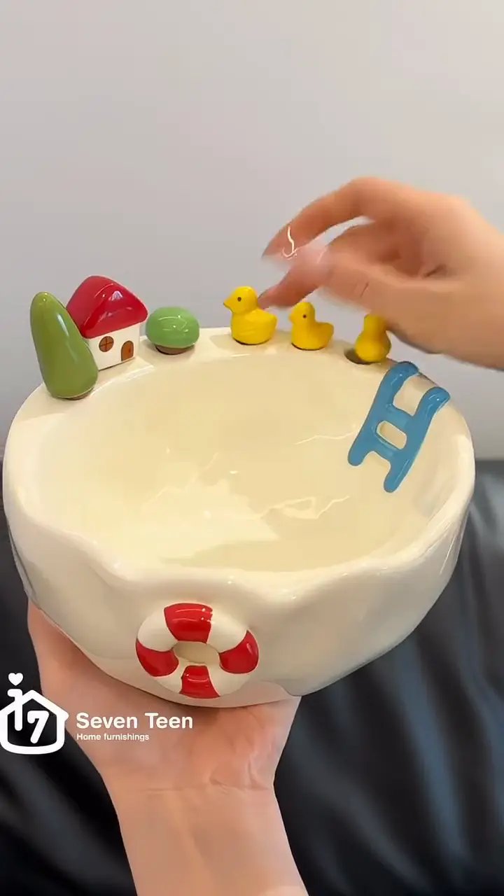 Cute ceramic fruit bowl with built-in snack forks